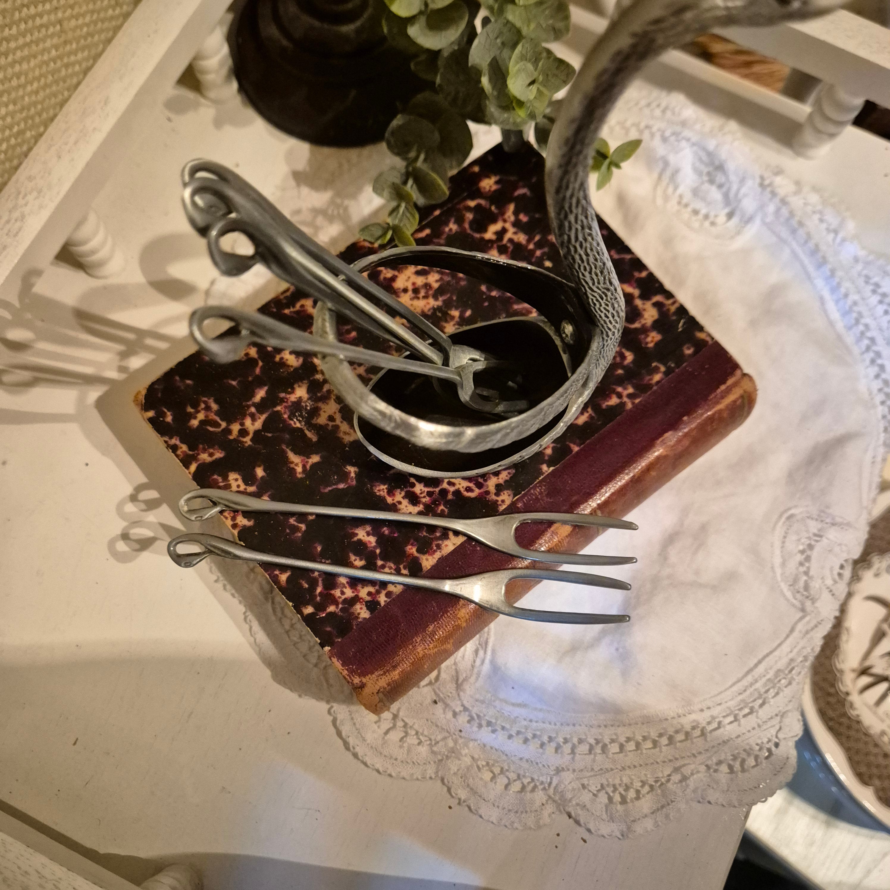 Vintage zwaanvormige bestekhouder