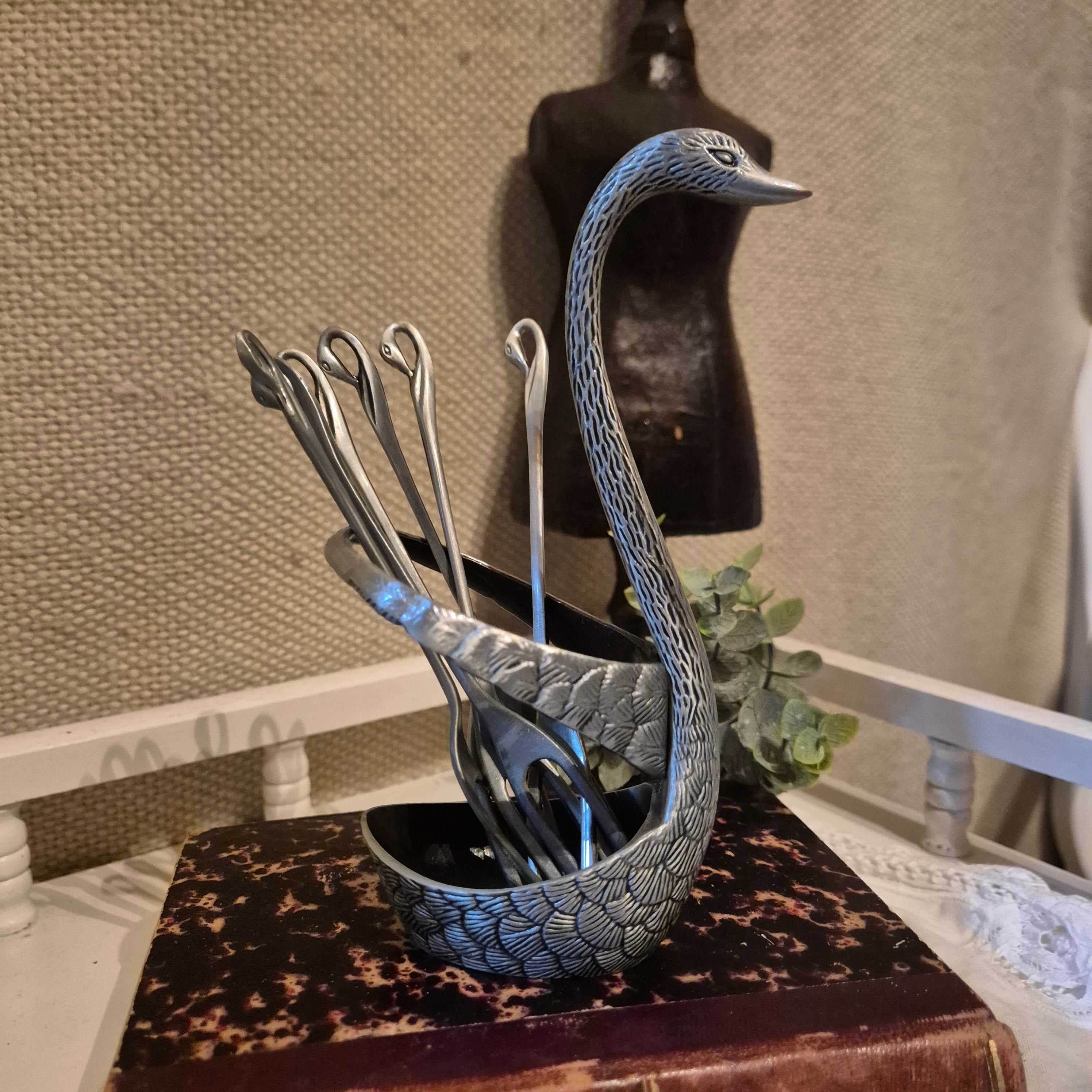 Vintage zwaanvormige bestekhouder
