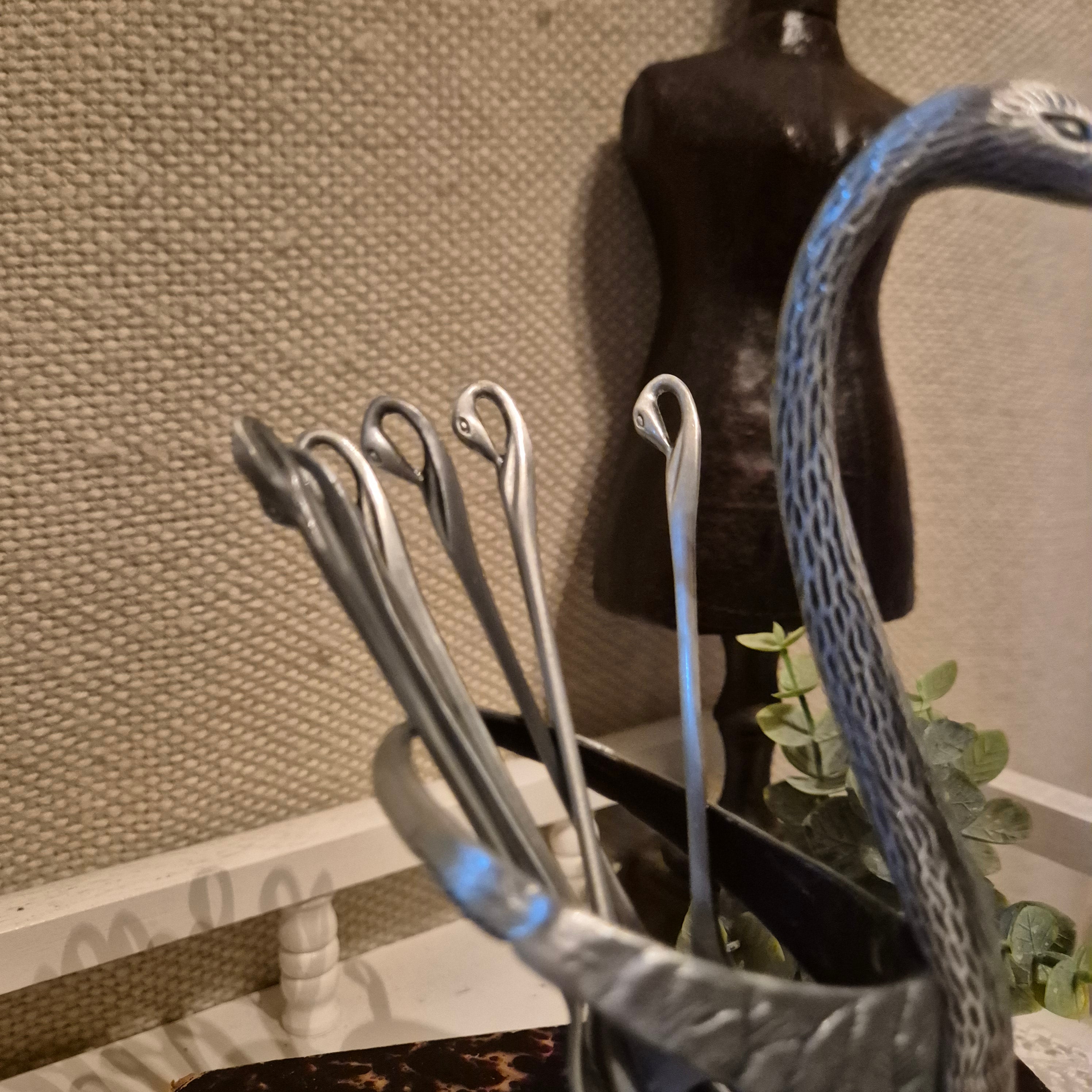 Vintage zwaanvormige bestekhouder