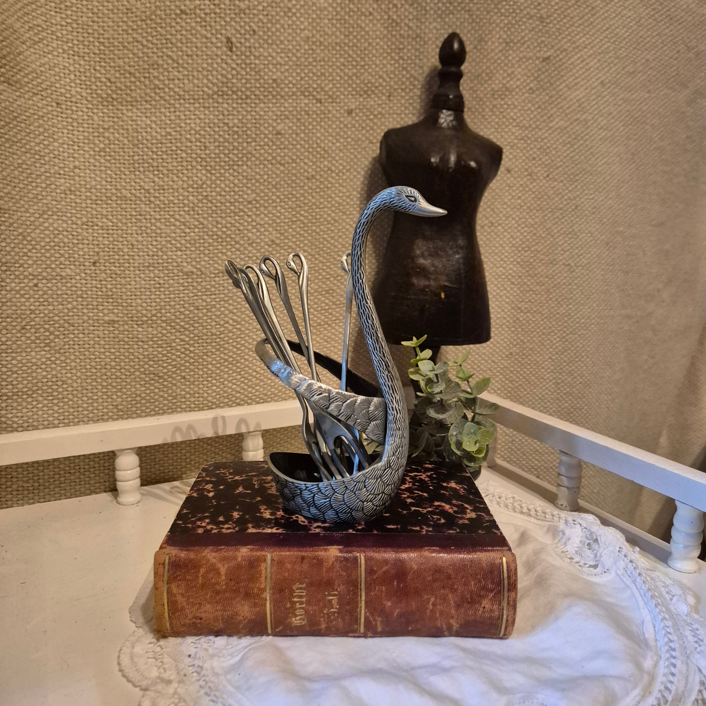Vintage zwaanvormige bestekhouder